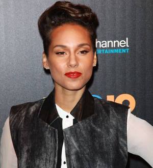 Alicia Keys visits Typhoon Haiyan evacuees