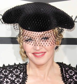 Madonna postpones Rebel Heart tour