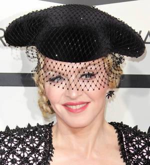 Madonna postpones Rebel Heart tour