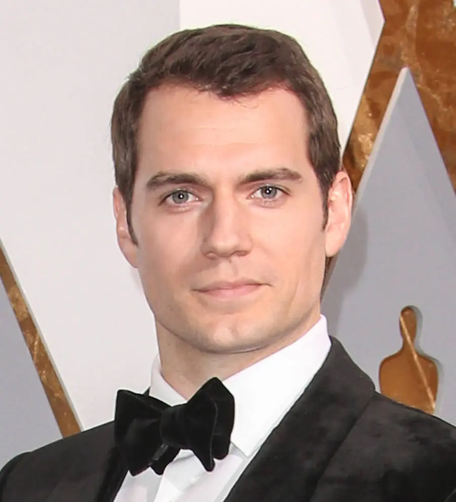 Henry Cavill bemoans 'slew of hate' that comes with a public relationship