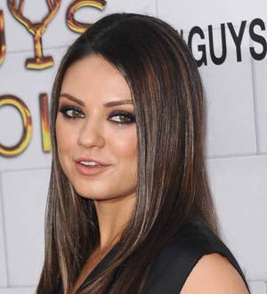 Mila Kunis beats the paparazzi to Pilates