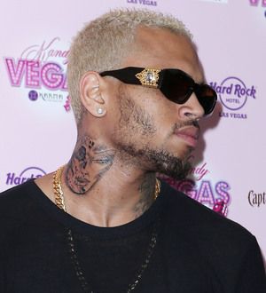 Chris Brown defends neck tattoo