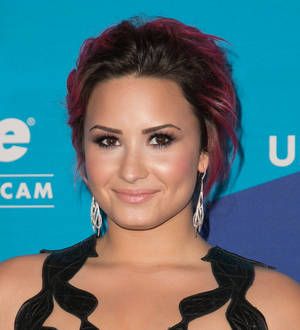 Demi Lovato determined to be a good role model