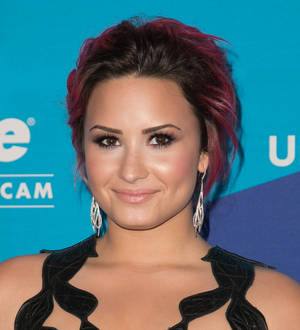 Demi Lovato determined to be a good role model