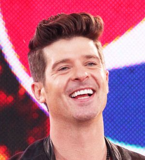 Robin Thicke puts off being a parent again