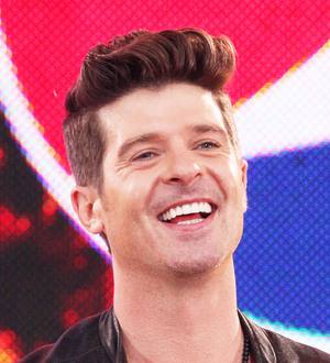Robin Thicke puts off being a parent again