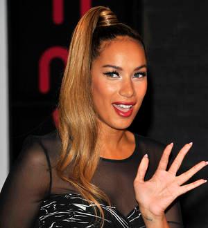 Leona Lewis shows racy side at bondage-themed bash