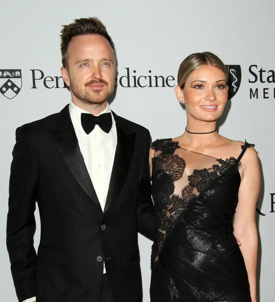 Aaron Paul stuns wife with Hong Kong airport surprise