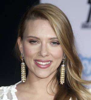 Scarlett Johansson bares all from the thighs down for new movie poster