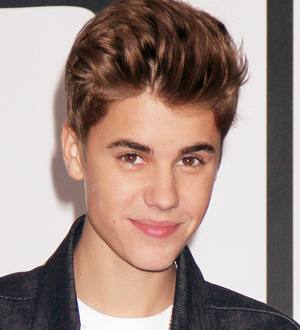 Justin Bieber debuts Believe at the top of the charts