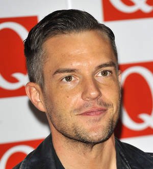Brandon Flowers beats Paul Weller to the top of the U.K. charts