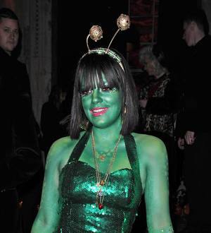 Lily Allen goes green for Halloween comeback
