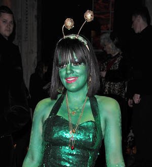 Lily Allen goes green for Halloween comeback