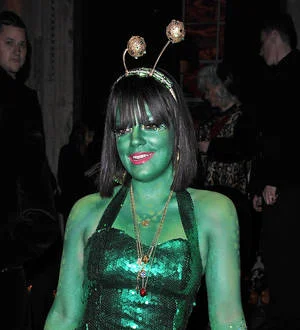 Lily Allen goes green for Halloween comeback