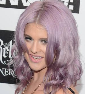 Kelly Osbourne turns down Elton John party to fly home