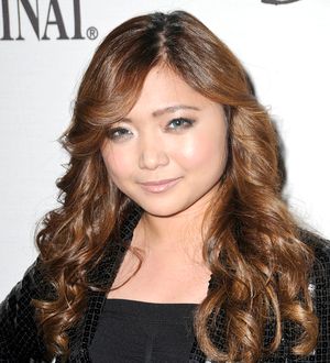Charice Pempengco returns home to Philippines following father's death