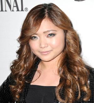 Charice Pempengco returns home to Philippines following father's death
