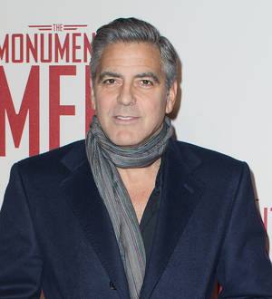 George Clooney shows off basketball skills back home in pick-up game