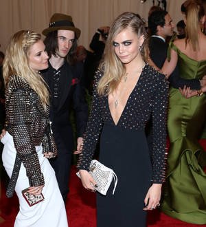Sienna Miller and Cara Delevingne smooch at Met Ball