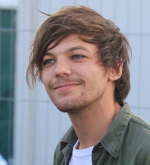 Louis Tomlinson 'buzzing' over baby news