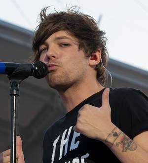 Louis Tomlinson to be a dad - report