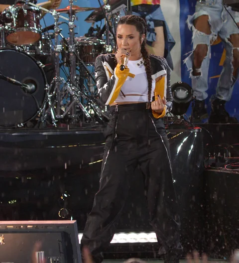 Demi Lovato brushes off storm to perform in Central Park