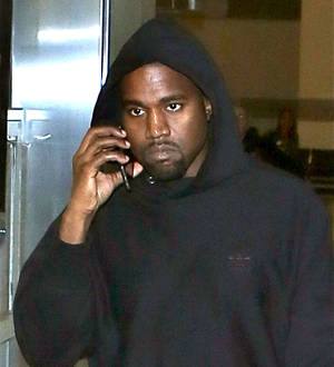 Kanye West apologises for fashion show delays