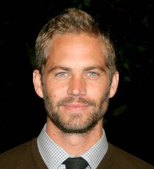 Paul Walker fans gather in the rain to pay respect to the star