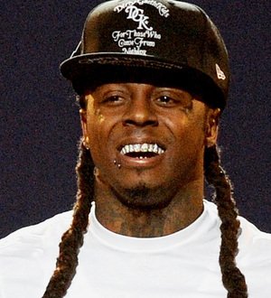 Lil Wayne beats Elvis Presley's chart record on birthday