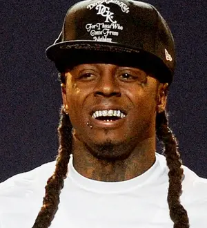 Lil Wayne beats Elvis Presley's chart record on birthday