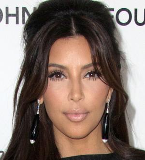 Kim Kardashian donating wedding gift money to charity