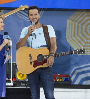 Luke Bryan takes another tumble during gig