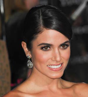 Nikki Reed misses Twilight premiere to sign autographs