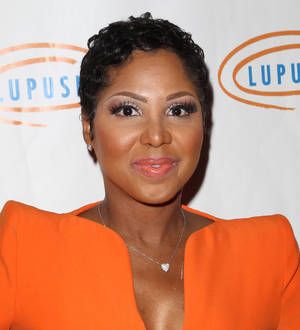 Toni Braxton wins date on TV game show