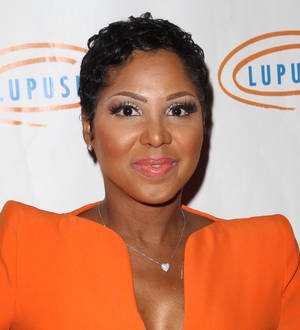 Toni Braxton wins date on TV game show