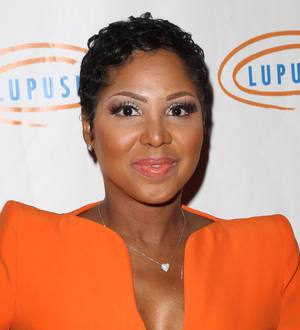 Toni Braxton wins date on TV game show