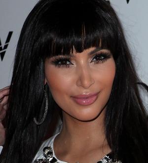 Kim Kardashian giving away clothes for charity