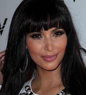 Kim Kardashian giving away clothes for charity