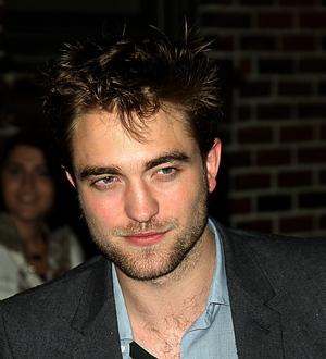 Robert Pattinson's album plans on hold because he can't handle the criticism