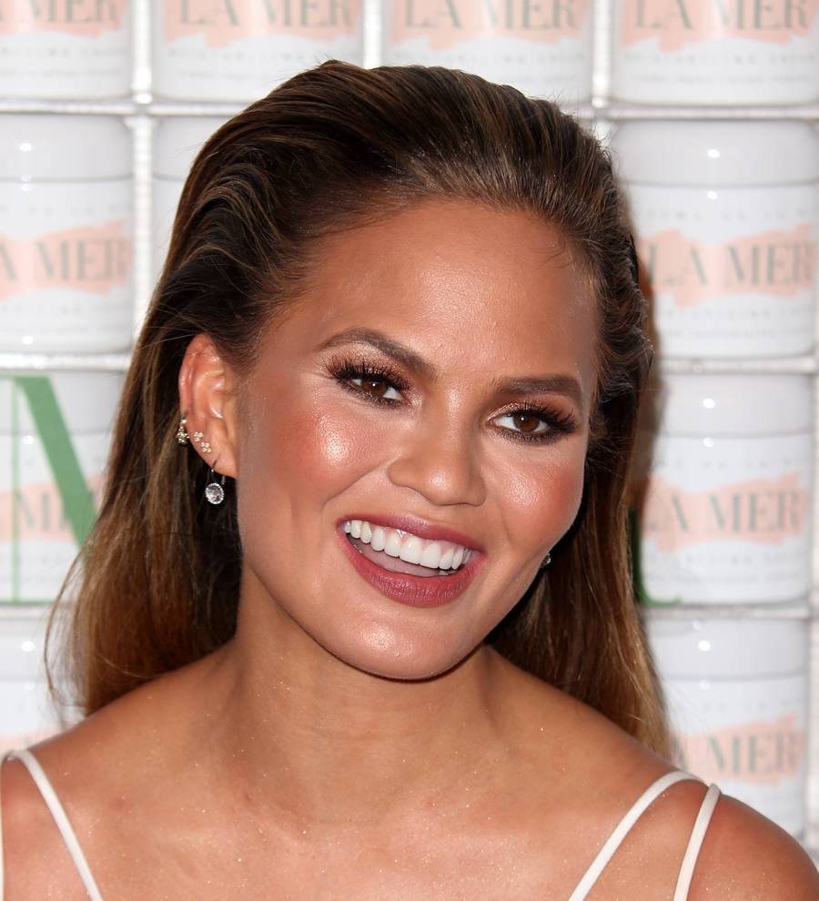 Chrissy Teigen's tailors fix baby bump wardrobe malfunction