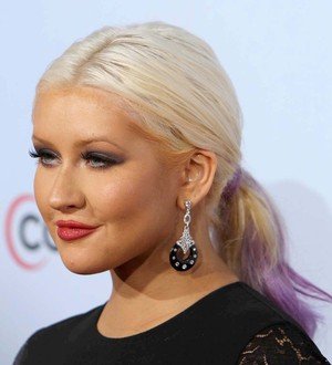Christina Aguilera was pressured into losing weight to boost business