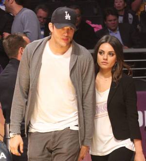 Ashton Kutcher and Mila Kunis wed in luxury secret garden