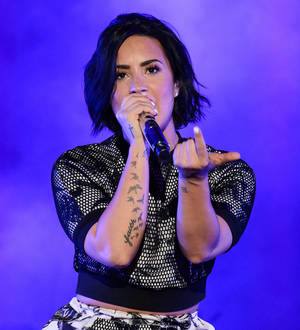 Demi Lovato embraces curvy figure in revealing photos