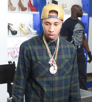 Tyga hit with legal papers at shoe launch