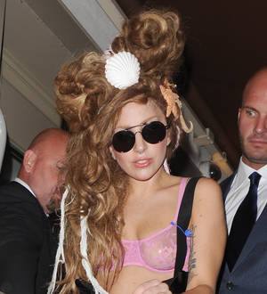 Lady Gaga grabs fish and chips in a sheer bra