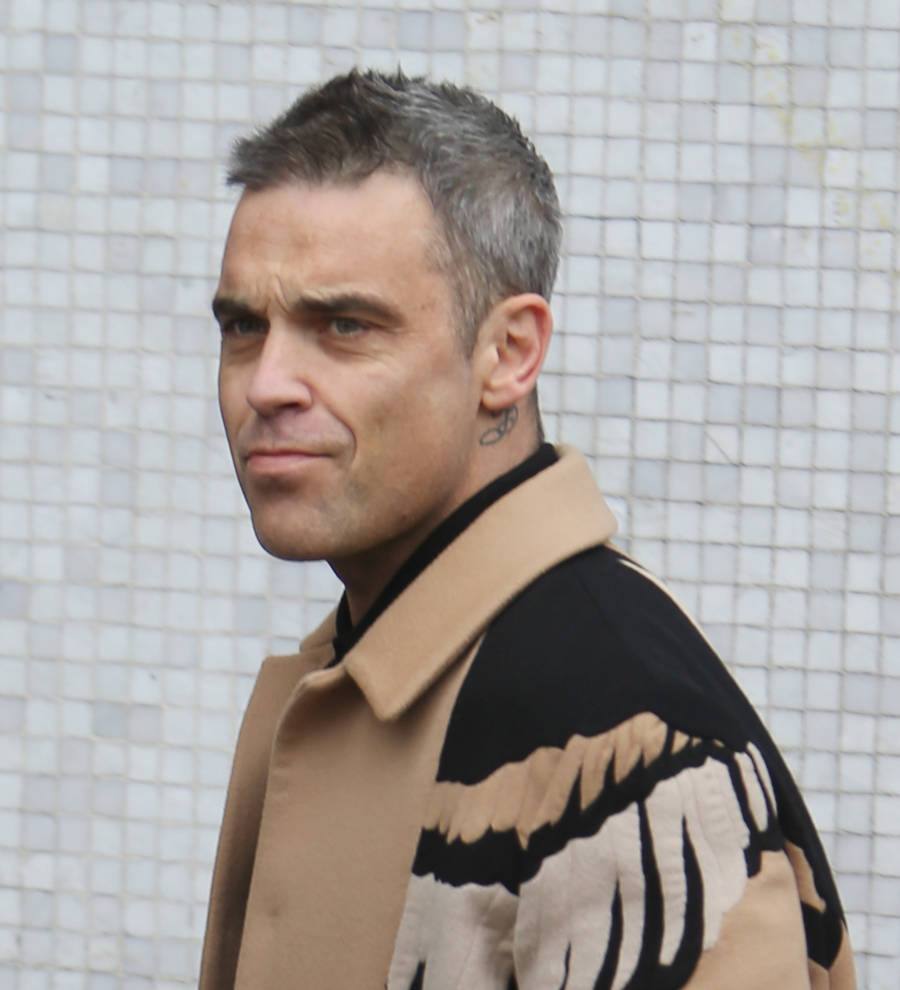 Robbie Williams urges everyone to drink coffee and 'breed'