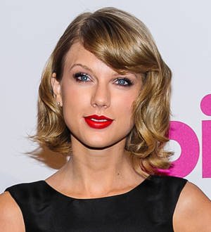 Taylor Swift accepts second Woman of the Year honor on birthday eve