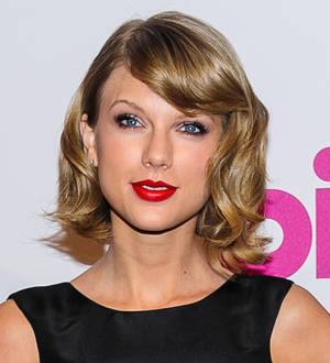Taylor Swift accepts second Woman of the Year honor on birthday eve