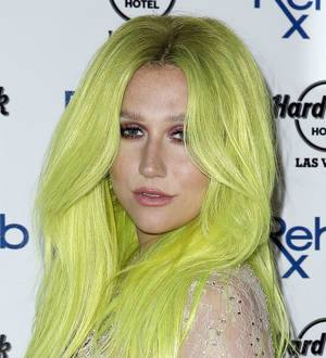 Kesha laughs off butt implant speculation