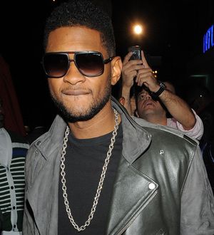 Usher's ex-wife wants singer to cover her legal costs